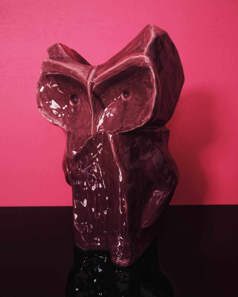 Side view of Marni x Serax aubergine owl vase showing bold stoneware form