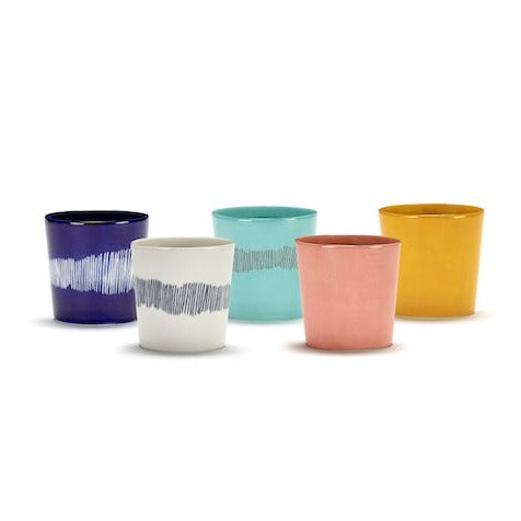 different colours of coffee cup in the ottolenghi range with azure and deep blue, pink, yellow and off white