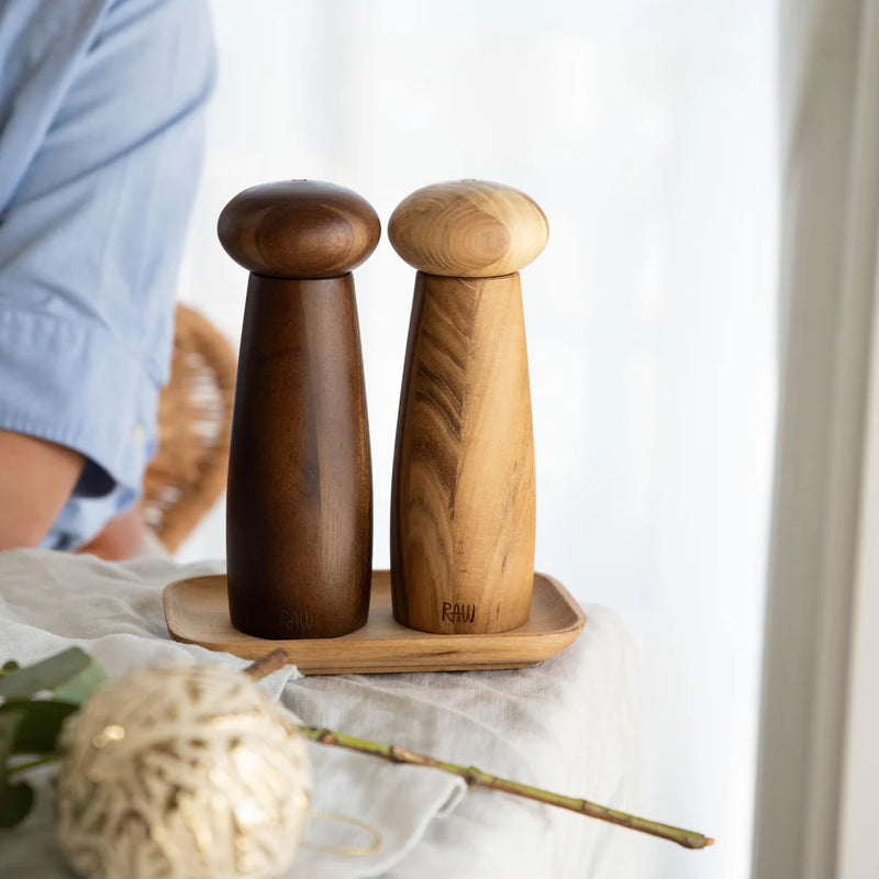 Mixed teak and dark wood grinders in Scandinavian style