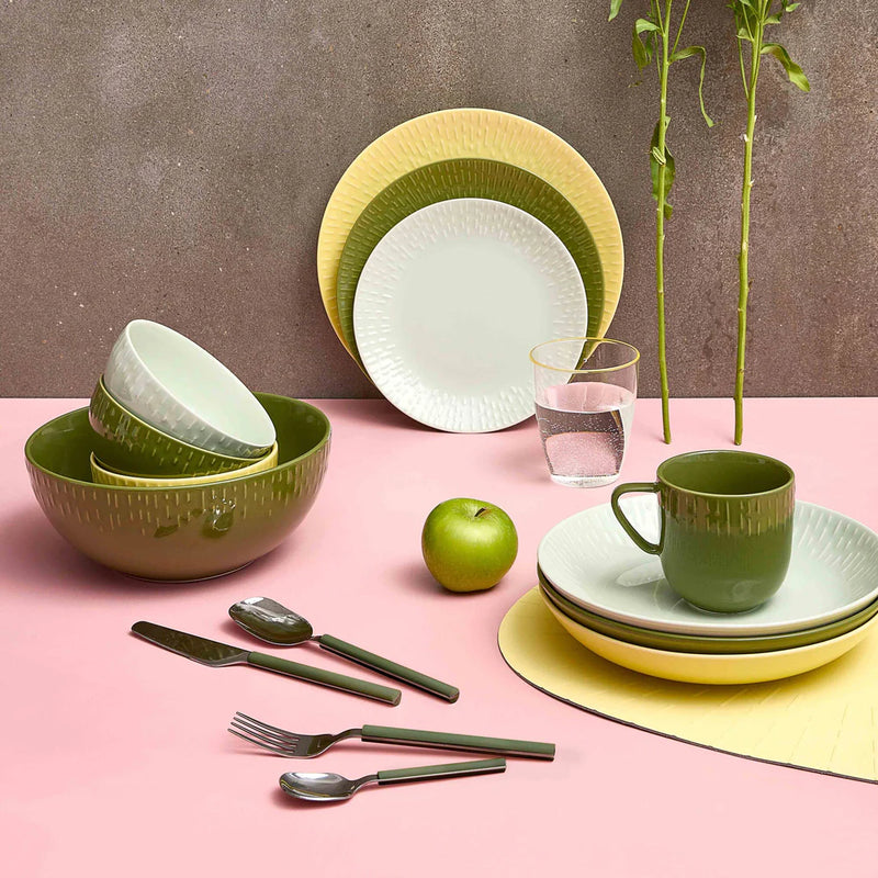 Aida Confetti olive green and silver cutlery set for four place settings styled in a table setting