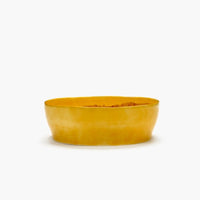 salad serving bowl by ottolenghi and serax in a glourious yellow and red stripe with a high side and deep glaze