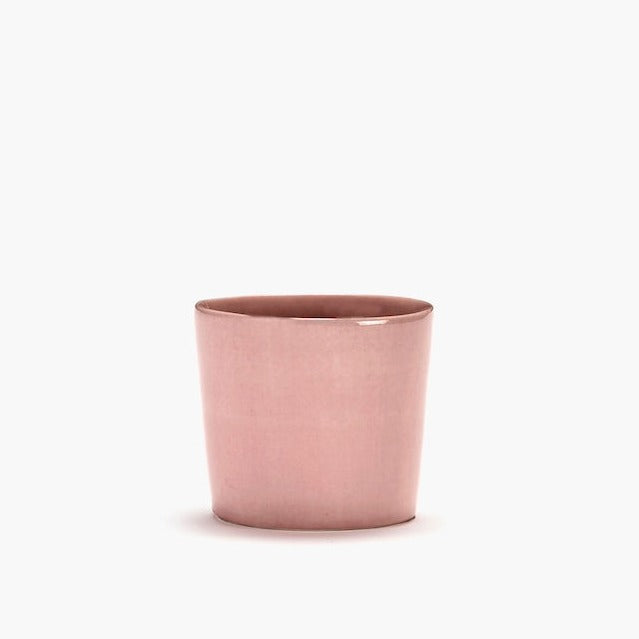 delicious pink espresso cup with a high shine and glaze making the upper rim glow almost gold from ottolenghi and serax