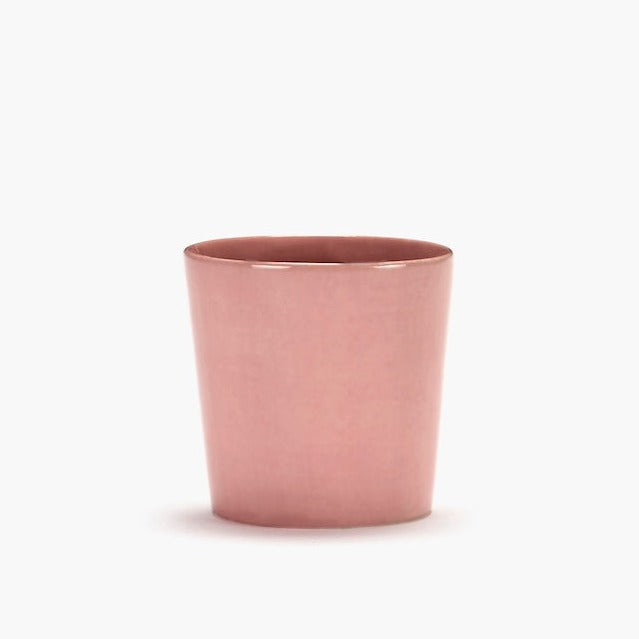 a shiny deliciously pink cup from ottolenghi revelling in the serax production quality