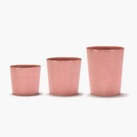 3 cups in a row showing the different sizes available in the ottolenghi by serax range all in dleicious pink with a high shine in this well glazed crockery