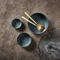 Handmade Northern Green stoneware bowl set with gold serving spoons