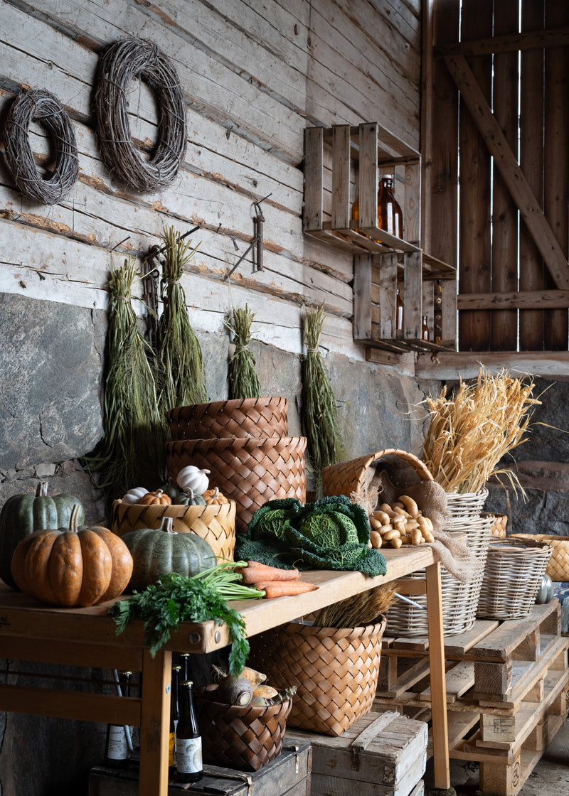 Warm-toned bristle grass styled with pumpkins and produce