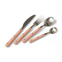 HKLIVING 70s Cutlery in peach: knife, fork, spoon and dessert spoon fanned out on a white background