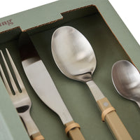 Close-up of the HKLIVING olive cutlery inside the green gift box