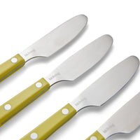 Close-up of HKLIVING lemon butter knives showing the curved stainless steel blades and rivet handles