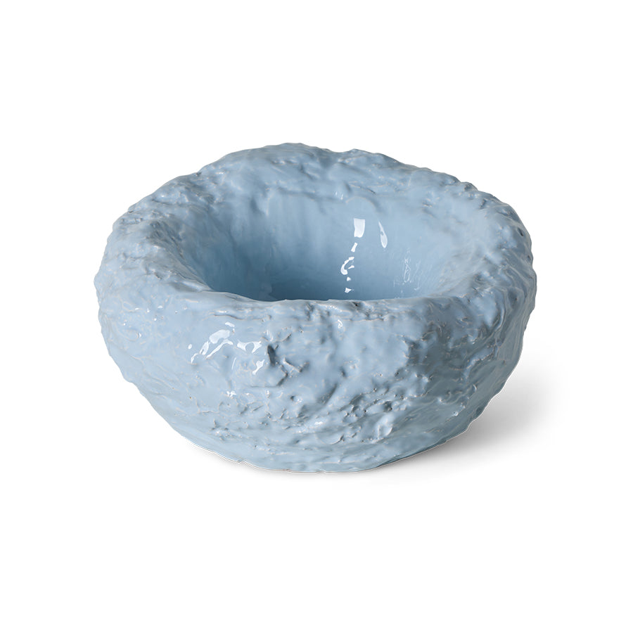 Close-up of the Cloud Bowl's textured, hand-shaped rim and pale sky-blue glaze