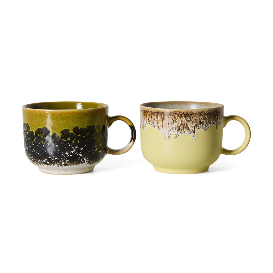 70s Ceramics tea mugs in Cravings, side by side showing the olive-black and mustard-cream speckled glazes and glazed interiors
