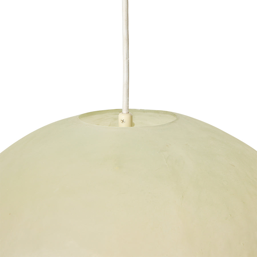 Large glassfibre pendant lamp styled above a dining table