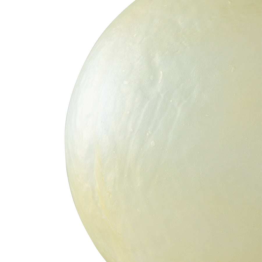 Large glassfibre pendant lamp in a styled interior