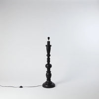 a lamp base without a lampshade showing the fixtures and the foot operated power switch from swedish home style of olsson and jenssen