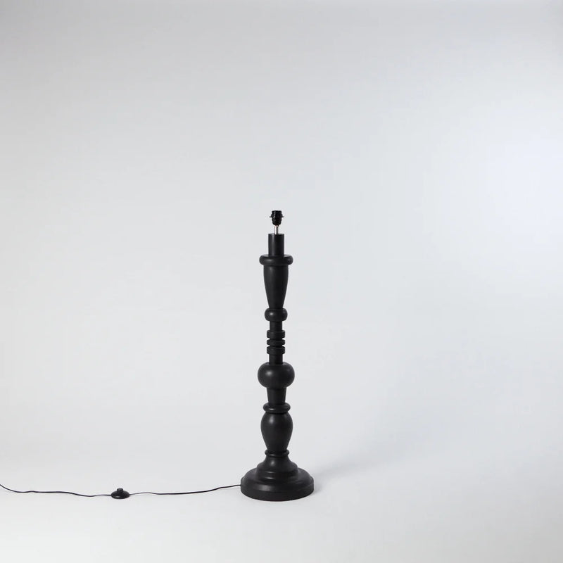 a lamp base without a lampshade showing the fixtures and the foot operated power switch from swedish home style of olsson and jenssen