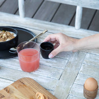 Small handmade ceramic cup for espresso set with a breakfast