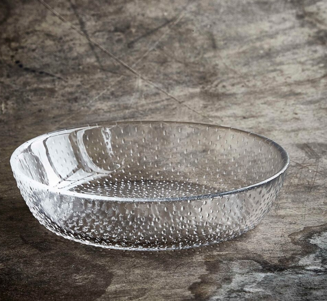 RAW Glass Beads clear salad bowl with textured surface on rustic table
