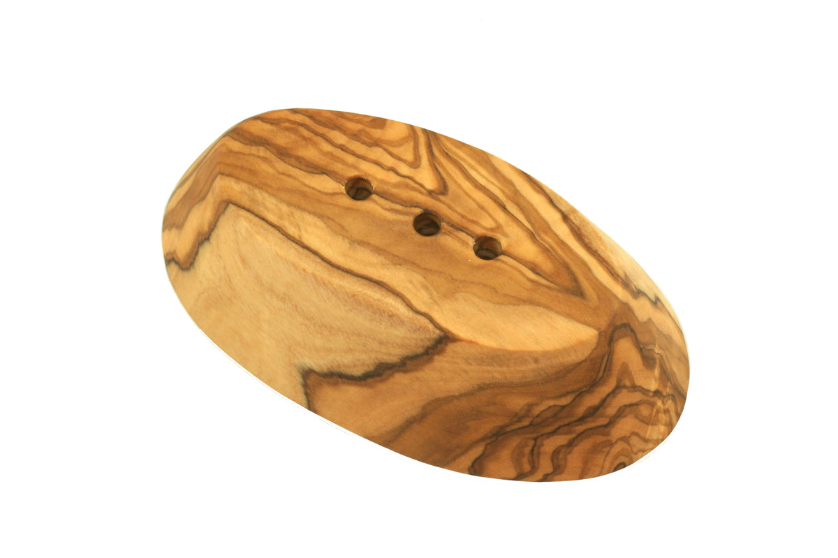 Upside-down olive wood soap dish shaker with visible grain of the wood on a white background