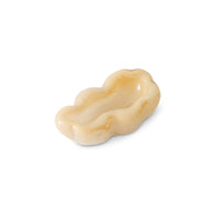 Side view of the HKLIVING oyster glass bowl on a plain white background, showing its shallow form and dappled cream colouring