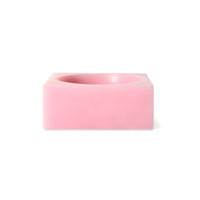 Studio shot of the HKLIVING Pop Cube Small in Pink on a white background, showing its square resin form and scooped bowl