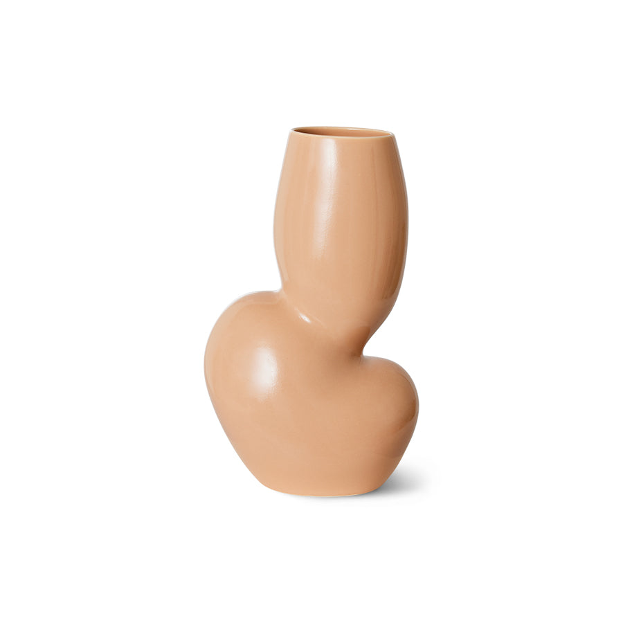 beige cream vase from hkliving with an almost kidney bean shape