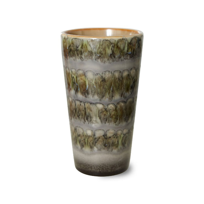 a tall coffee cup without a handle but with swirled colours in a 70s or 80s style of green, grey, and brown