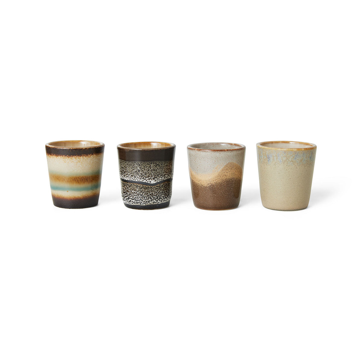 a range of almost 80's brown  hkliving egg cups looking like small coffee cups or shot glasses