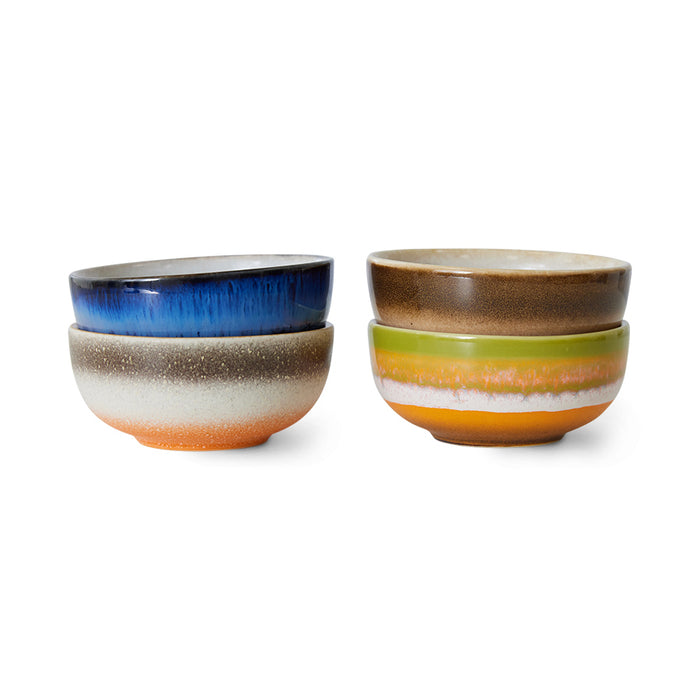 bright colours of hkliving 70s collection bowls stacked one in the other with blue, brown, green, beige, orange , and red