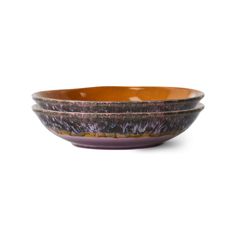 side view of 2 stacked bowls with purple and pink swirled around the side in a joyful 70's style