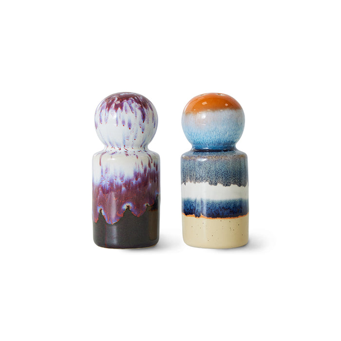 hkliving salt and pepper shakers look just like little people with the globulous heads but with colours you'd expect to see shooting out of a wizards wand wth purple, black, white greens and blues