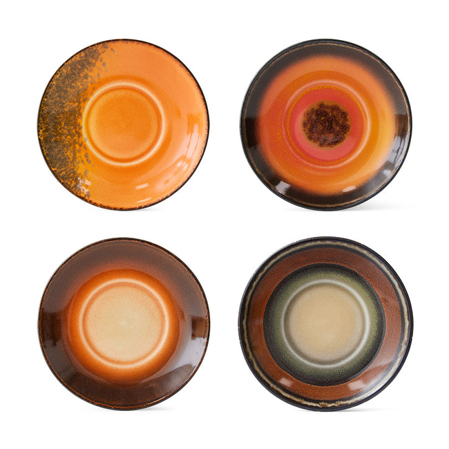 set of 4 saucers for coffee cups in different colours reminiscent of roasted coffee with the heat of reds and oranges permeated the beiges and brown rings in these hkliving tableware pieces