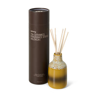Valencia reed diffuser in yellow stoneware bottle with reeds and box