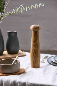 Aida RAW tall pepper grinder in warm teak wood