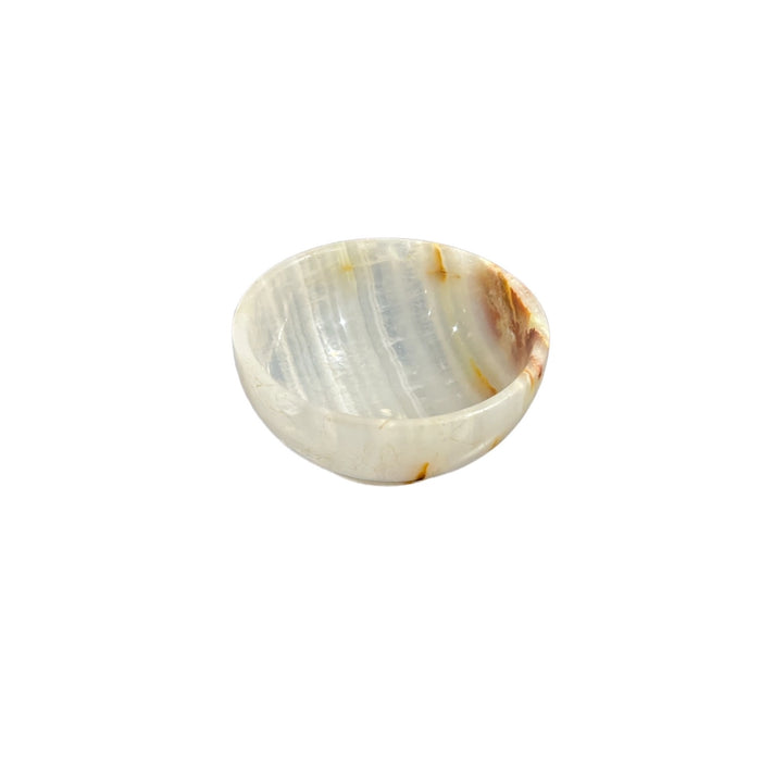 Small marble bowl with unique onyx tones for home decor