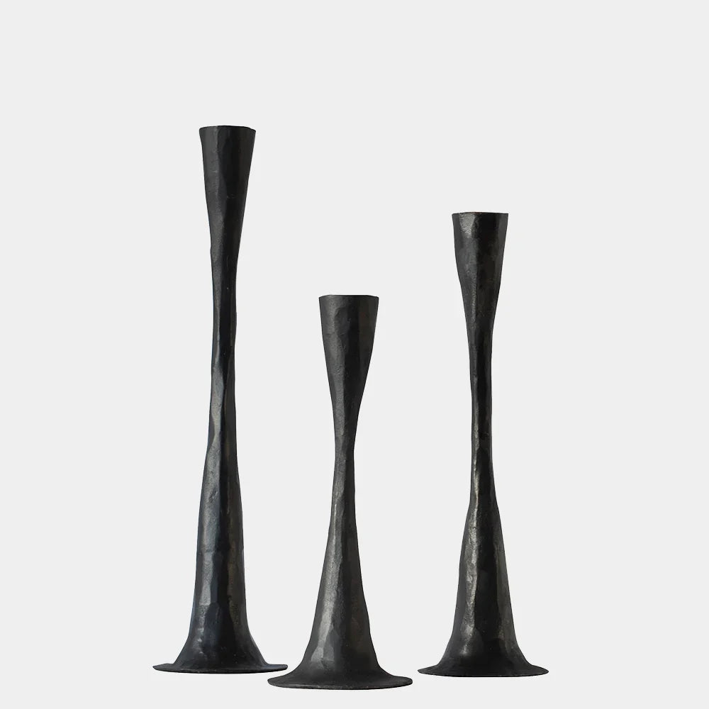 Set of three Ashraf black cast iron taper candlesticks by Olsson & Jensen