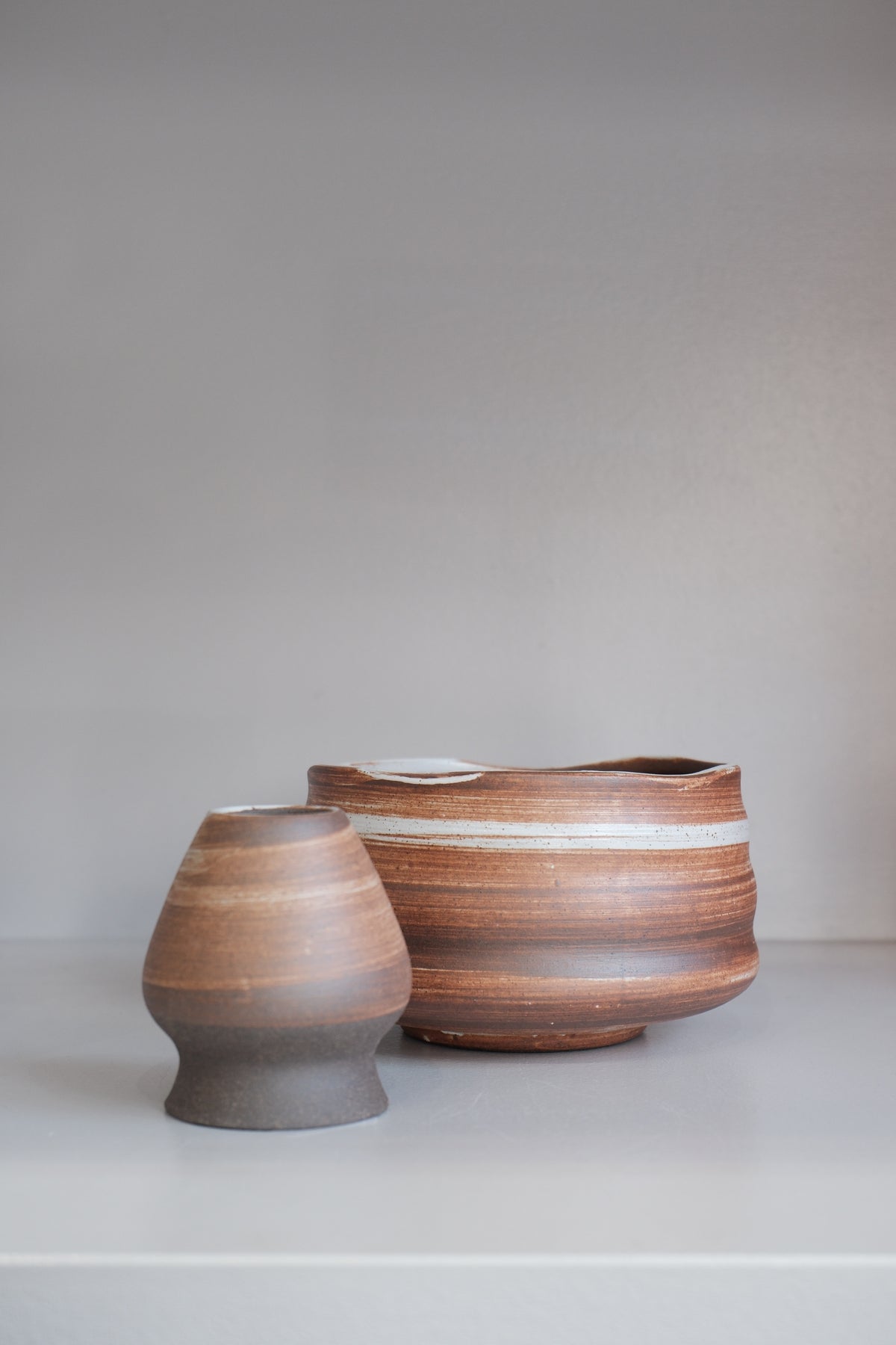 auburn stoneware matcha bowl showing natural glaze variation