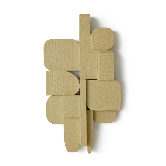 rough textured and mismatched shapes create a wall art in a beige from nordic design house hkliving