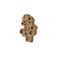 Angled view of the HKLIVING brutalist wall sculpture in terracotta, highlighting the depth and texture of its carved circles and rectangles