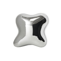 Chrome orb wall sculpture with a reflective, liquid-like finish on a white background