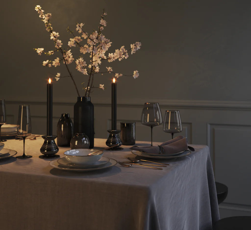 Pair of black LED dinner candles with realistic flame shown in colour swatch