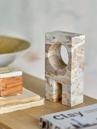 close up of bloomingville aoxi marble sculpture showing natural stone patterns