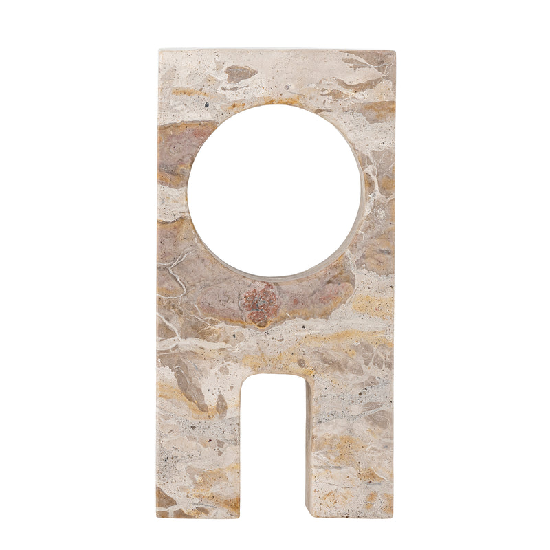 front view of the aoxi marble sculpture by bloomingville with circular cut out