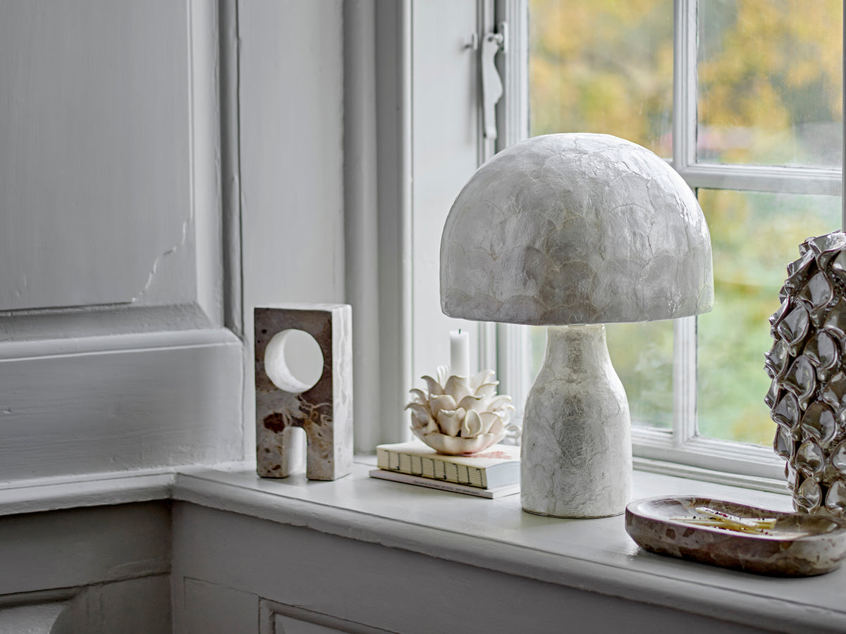 alt text: marble decorative sculpture by bloomingville styled on a windowsill with calm neutral home decor
