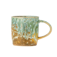 green milani mug by bloomingville with vivid reactive glaze in green and ochre