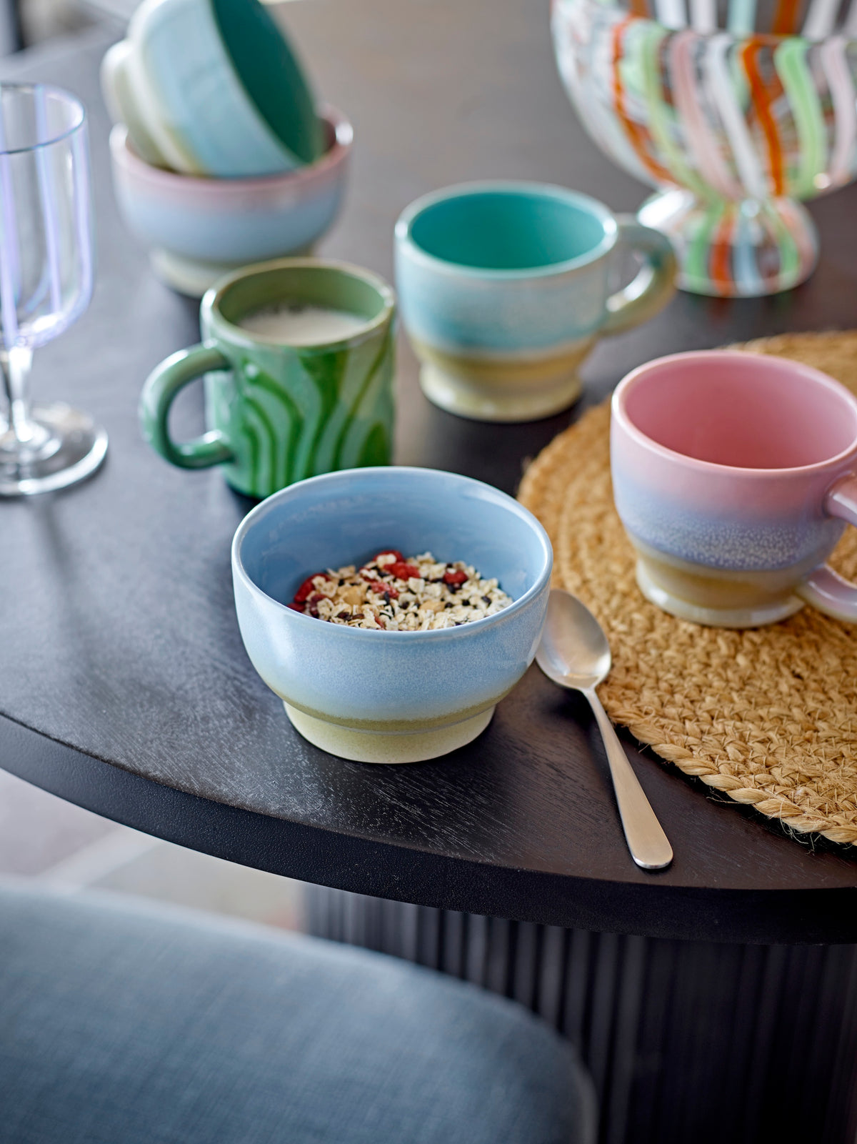 colourful stoneware mugs including green Bloomingville ninka mug on a breakfast table for cosy mornings