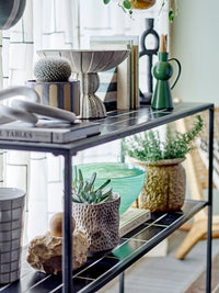 ramina black candle holder by bloomingville on styled shelf with nordic decor
