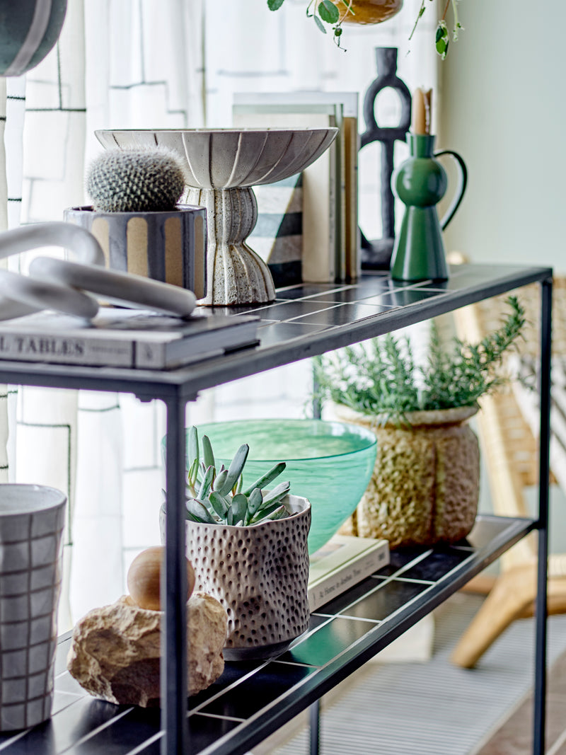 ramina black candle holder by bloomingville on styled shelf with nordic decor
