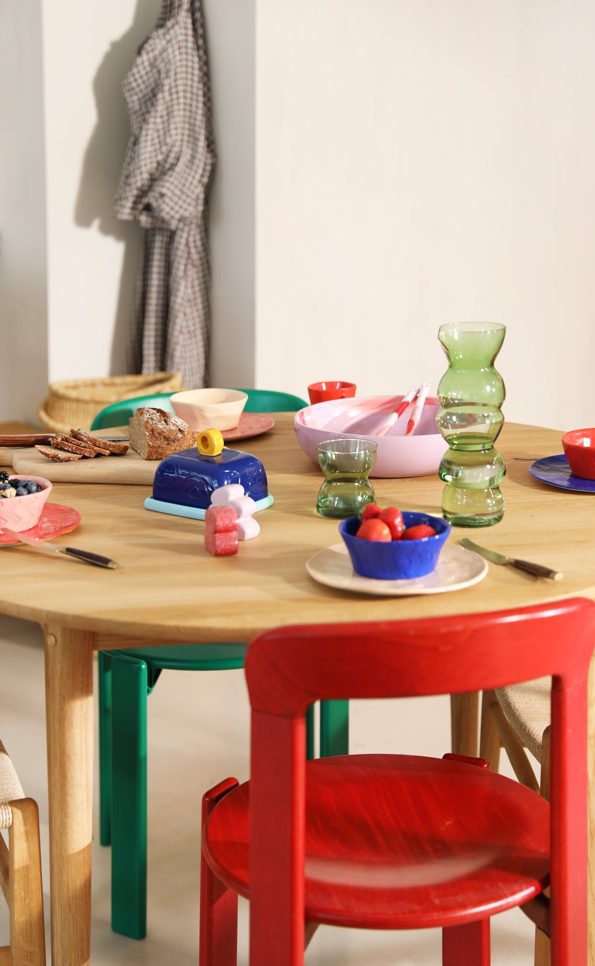 Playful blue butter dish by &Klevering styled on a colourful breakfast table for a happy, lived-in feel.