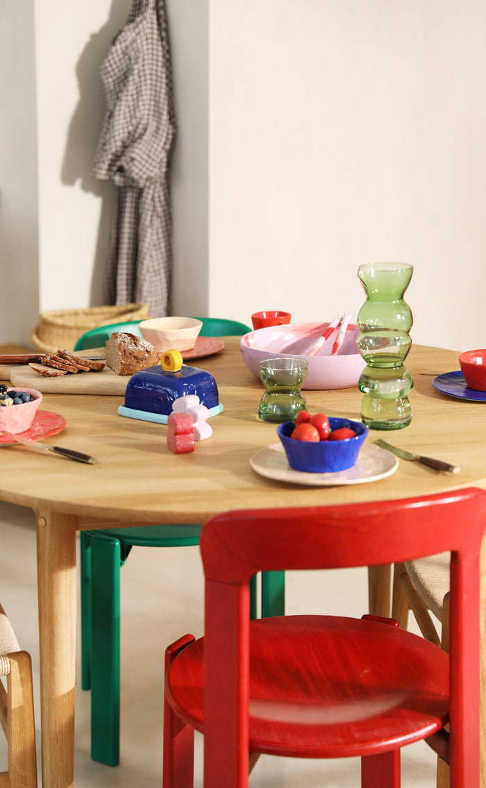 Playful blue butter dish by &Klevering styled on a colourful breakfast table for a happy, lived-in feel.