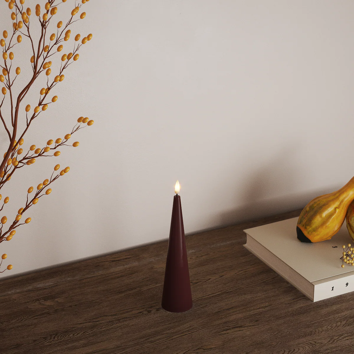 tall burgundy led cone candle adding warm mood lighting to interior